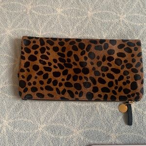 Claire V cheetah foldover clutch
